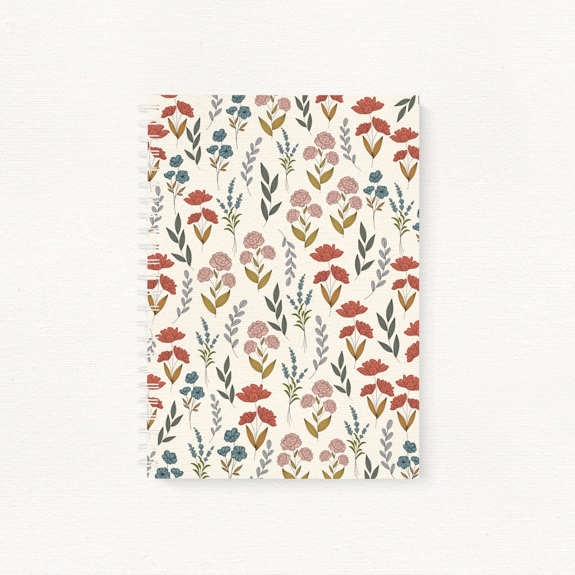 Notebook with a floral pattern on a white background