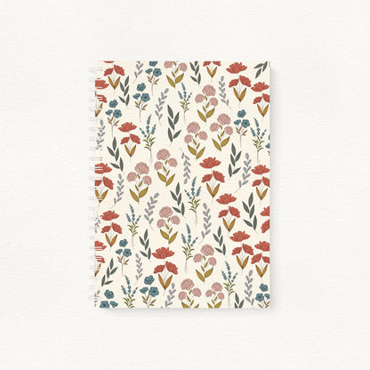Notebook with a floral pattern on a white background