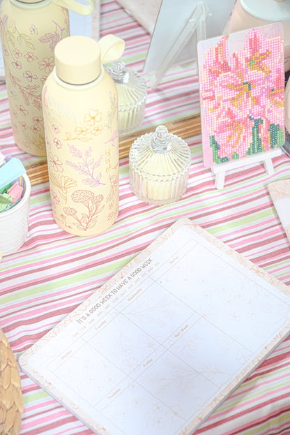 Waridi weekly planner open showing weekly spread layout — The Art Carte Kenya
