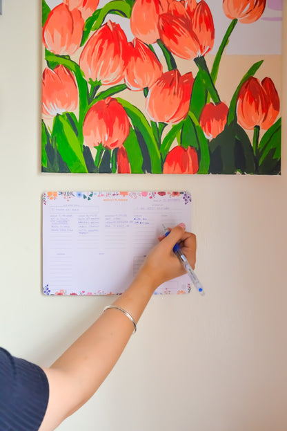 Flora weekly planner open showing weekly spread layout — The Art Carte