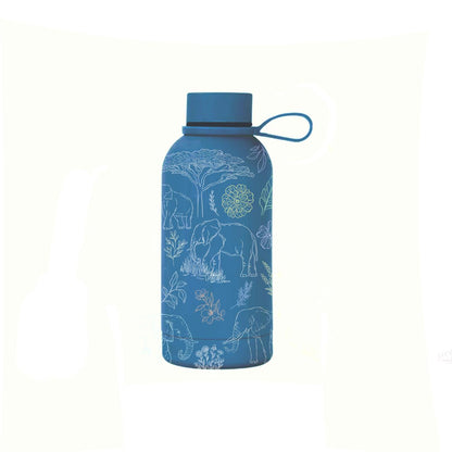 Tembo insulated mini bottle lifestyle shot on textured surface — The Art Carte