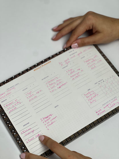Msanzi weekly planner open showing weekly spread layout — The Art Carte