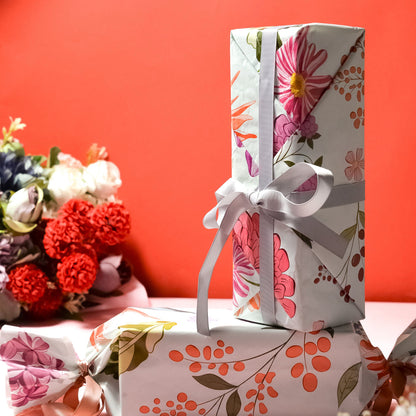Botanical Garden gift wrap styled around a wrapped gift — The Art Carte