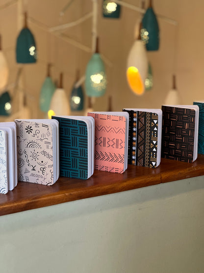 Mila pocket sketchbook trio flat lay showing all three covers — The Art Carte